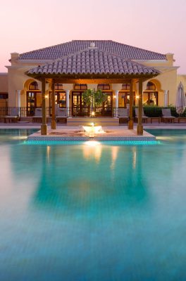 A architectural photograph of the pool area of Arabian Ranches Polo Club, Dubai