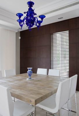Interior photograph showing the dining room design of an Emirates Hills villa, Dubai.