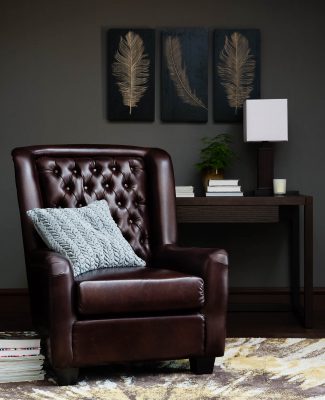 An interior vignette showing a leather armchair for Homecentre, Dubai